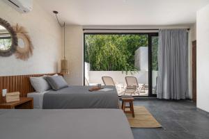 Posezení v ubytování Twelve O'Clock - Luxury Villas + 127 fotografií