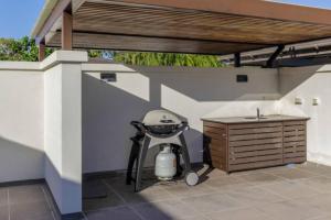 Fotografie z fotogalerie ubytování Devine Rooftop Penthouse at Temple Resort v destinaci Port Douglas