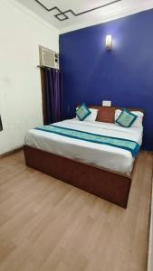 Giường trong phòng chung tại The Grace BNB