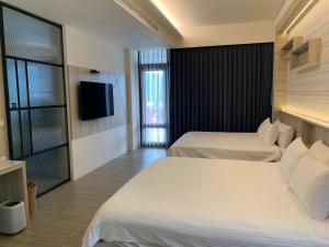 亮院子旅墅 Bright Courtyard客房内的一张或多张床位