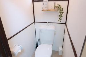 a bathroom with a white toilet in a room at green park heights - Vacation STAY 15684 in Musashino