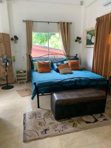 Postel nebo postele na pokoji v ubytování Villa du Bonheur Mer et Nature Rawai beach + 57 fotografií