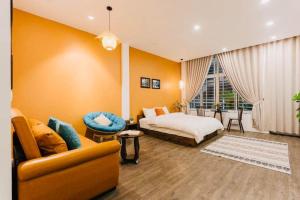 Postel nebo postele na pokoji v ubytování Oh Trendy Homestay Phạm Ngũ Lão