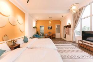 TV a/nebo společenská místnost v ubytování Oh Trendy Homestay Phạm Ngũ Lão + 17 fotografií