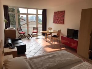 A seating area at Apartment - Studio Arndt - Riva del Garda - 200 Meter Vom See