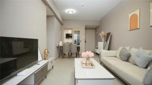 Serveyou International Apartment Hotel - Free Airport Pickup & Free Canton Fair shuttle & Paid City Tour TV 또는 엔터테인먼트 센터