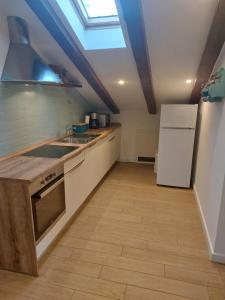 Kuchyň nebo kuchyňský kout v ubytování Apartment Nina