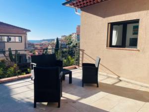 Balcon ou terrasse dans l'établissement Cocon 4 pers vue mer