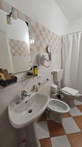 Koupelna v ubytování Hotel Montecodeno