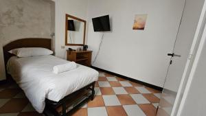 Postel nebo postele na pokoji v ubytování Hotel Montecodeno