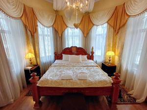 Postel nebo postele na pokoji v ubytování Pegasa Pils Spa Hotel