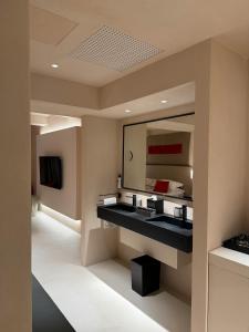Kuchyň nebo kuchyňský kout v ubytování Hotel Palazzo Durazzo Suites