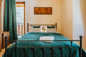 Postel nebo postele na pokoji v ubytování VisitZakopane - Ibiza Apartment