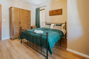 Postel nebo postele na pokoji v ubytování VisitZakopane - Ibiza Apartment