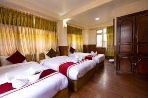 Un pat sau paturi într-o cameră la Hotel Sekai
