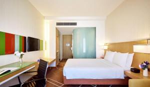 מיטה או מיטות בחדר ב-Vega Suites