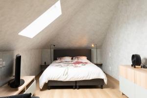 Postel nebo postele na pokoji v ubytování Stijlvol appartement met jacuzzi & sauna + 32 fotografií