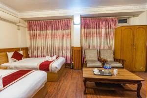 Un pat sau paturi într-o cameră la Hotel Sekai
