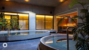 Bazén v ubytování Grandi by Center Hotels nebo v jeho okolí
