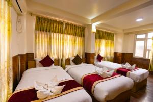 Un pat sau paturi într-o cameră la Hotel Sekai