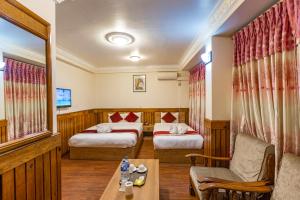Un pat sau paturi într-o cameră la Hotel Sekai