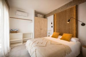Llit o llits en una habitació de K-MOON Apartment