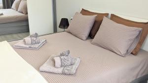 Ένα ή περισσότερα κρεβάτια σε δωμάτιο στο Lux 2 Central Apartment with Garage