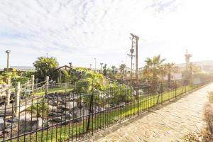 a roller coaster at a park at Modern 2 Berth Seaside Studio Apartment On Ground Floor In Hemsby, Ref 99011ws in Great Yarmouth