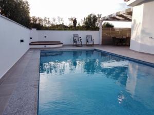 Bazén v ubytovaní Casa Su Soli Sardu II - Sea View alebo v jeho blízkosti