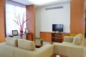 TV a/nebo společenská místnost v ubytování The Maple Suite