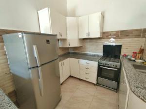 A kitchen or kitchenette at Cleopatra House