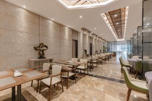 Posezení v ubytování UrCove by Hyatt Shanghai Pudong East