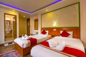 Un pat sau paturi într-o cameră la Hotel Sekai