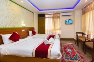 Un pat sau paturi într-o cameră la Hotel Sekai