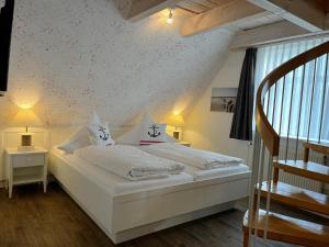 Voodi või voodid majutusasutuse Hotel Anka toas