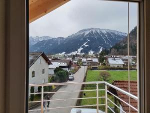 a view of a mountain from a balcony at Breitenbergerhof Pfronten in Pfronten