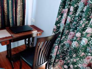 Posezení v ubytování Mango Tree Guestroom