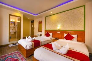 Un pat sau paturi într-o cameră la Hotel Sekai