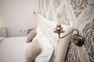 Ένα ή περισσότερα κρεβάτια σε δωμάτιο στο Apartment Primula