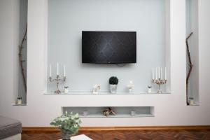 Μια τηλεόραση ή/και κέντρο ψυχαγωγίας στο Apartment Primula