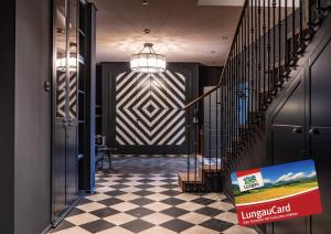 Лобби или стойка регистрации в HERBERT - Boutique Apartments inkl Lungau Card