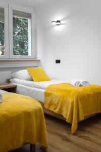 Ліжко або ліжка в номері Apartament Pogodny Lazur