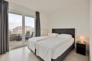 Letto o letti in una camera di Karthuizer Penthouse