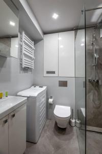 Ванна кімната в Apartament Pogodny Lazur