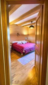 Ein Bett oder Betten in einem Zimmer der Unterkunft Appartamento Sandra - Molino