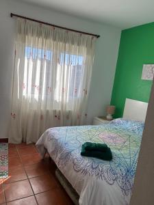 Postel nebo postele na pokoji v ubytování Casa Rural La Manzanilla