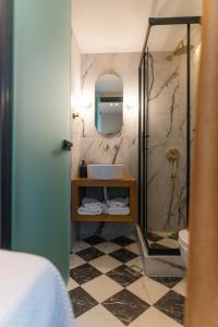 Kúpeľňa v ubytovaní Aggelos Hotel + 24 fotografií