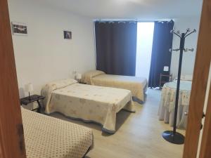 Postel nebo postele na pokoji v ubytování QUINTA ANDAINA