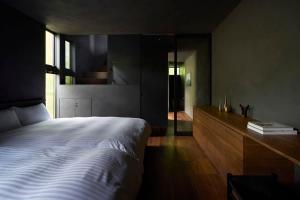 Seaside Villa SEEN Deep Sea客房内的一张或多张床位