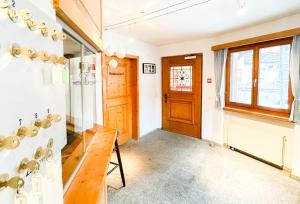 Area soggiorno di Workation Apartments - 24-7 Self-Checkin - Hotel Postigliun Sedrun